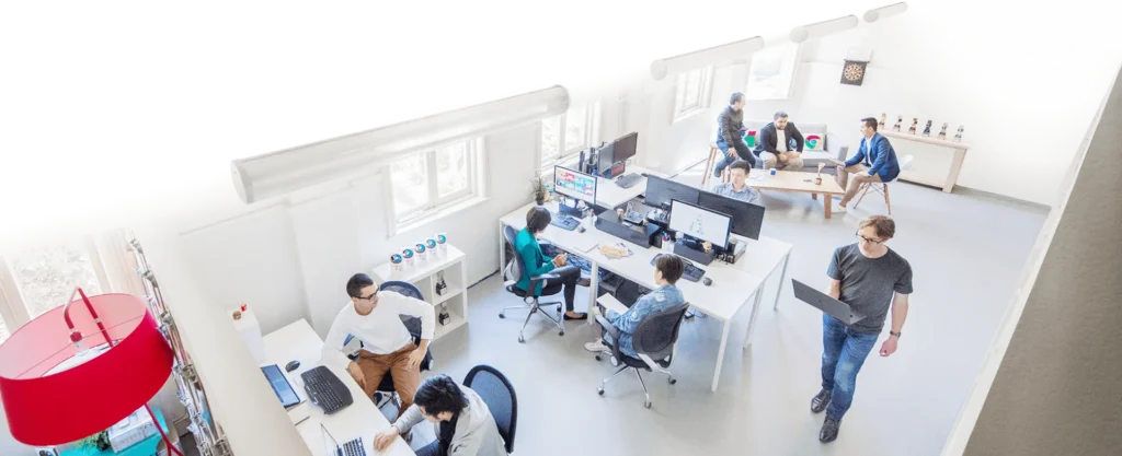 Designers and developers working together in a Melbourne web design studio
